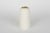 Jarrón de porcelana con interior esmaltado, color blanco puro y borde dorado. Colección Candle